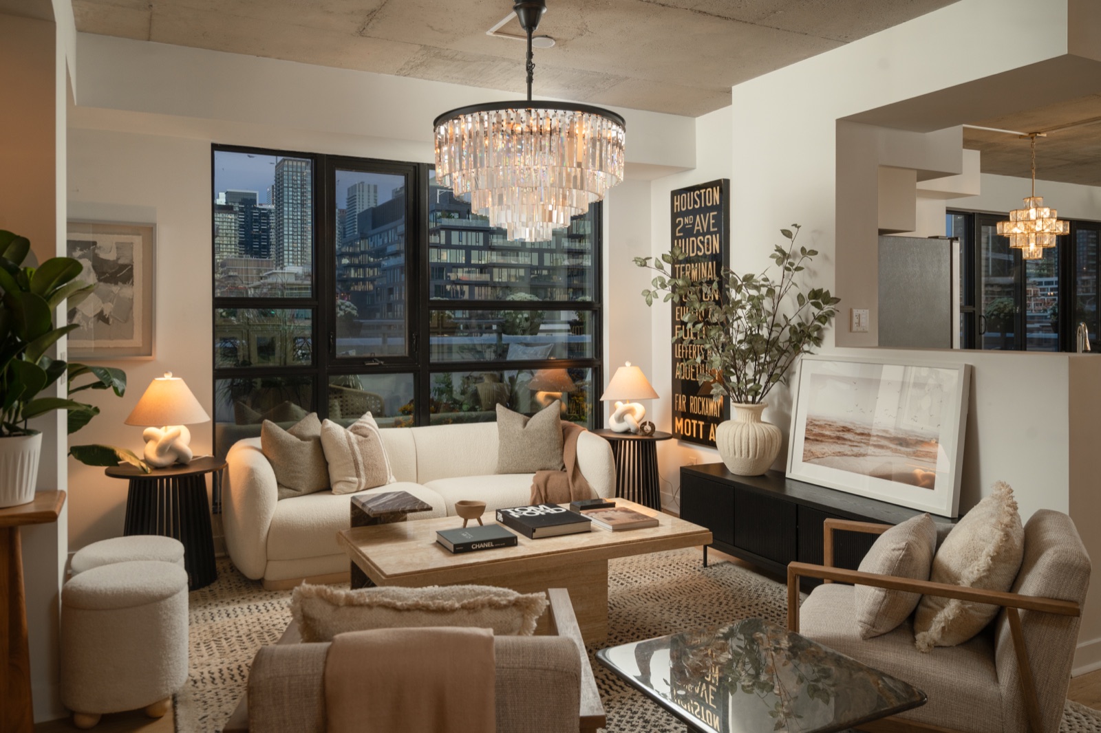 Living room at dusk under the crystal chandelier