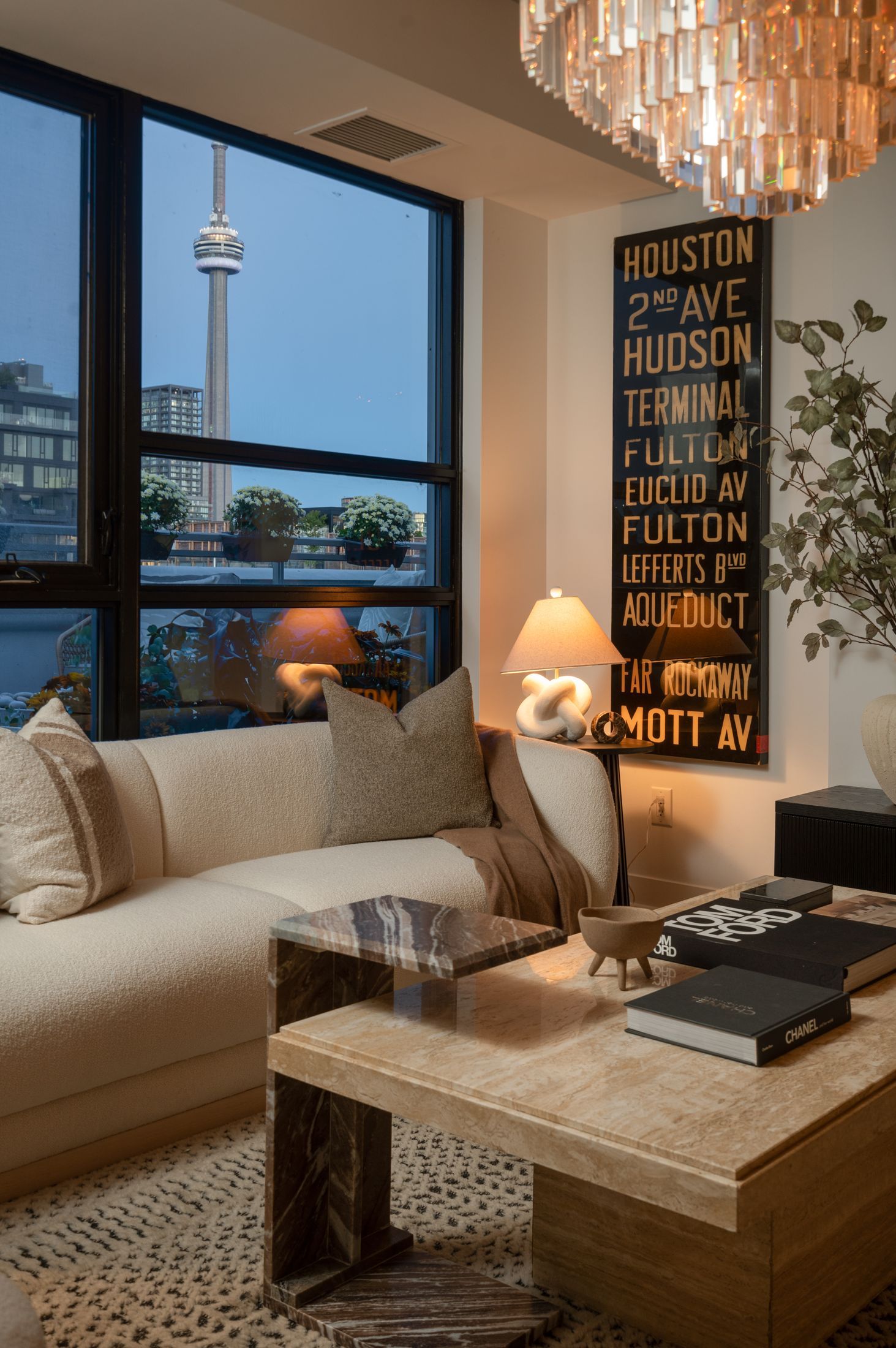 Living room seating with the CN Tower beyond